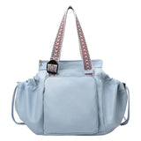 Drawstring Pocket Tote in blue, front view