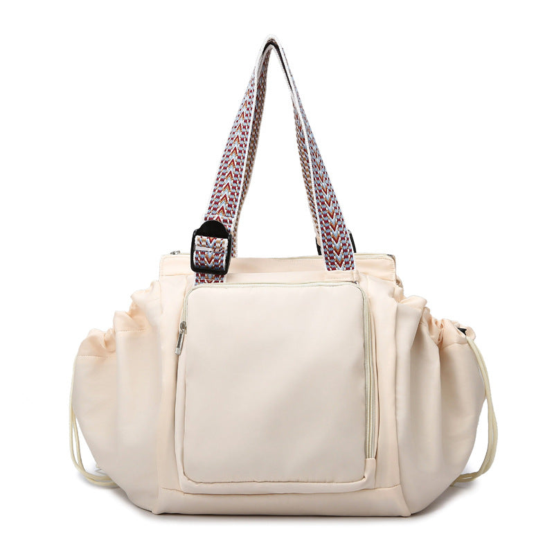 Drawstring Pocket Tote in beige, front view