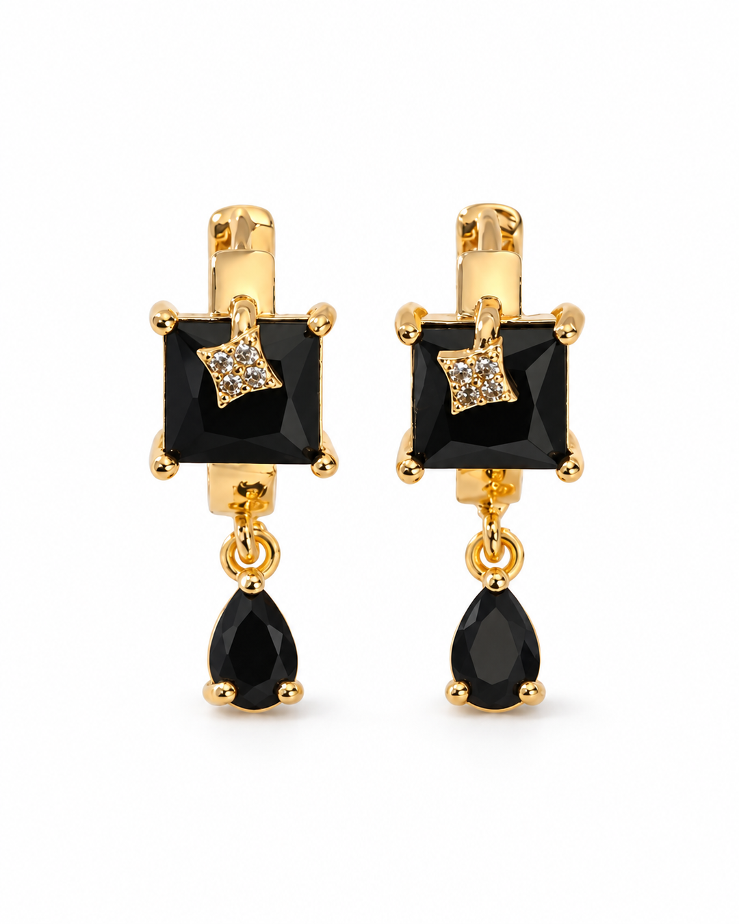 Black square drop earrings on a white background