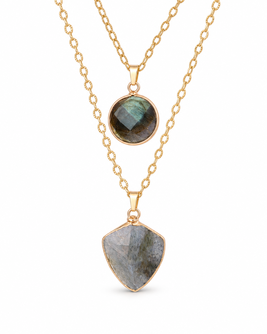 Layered stone pendant necklace on a white background