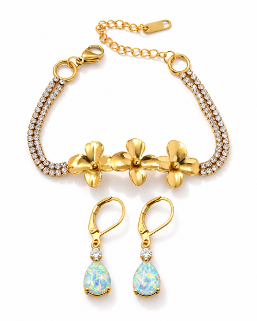 Gold-tone flower bracelet and opal-look teardrop earrings on a white background