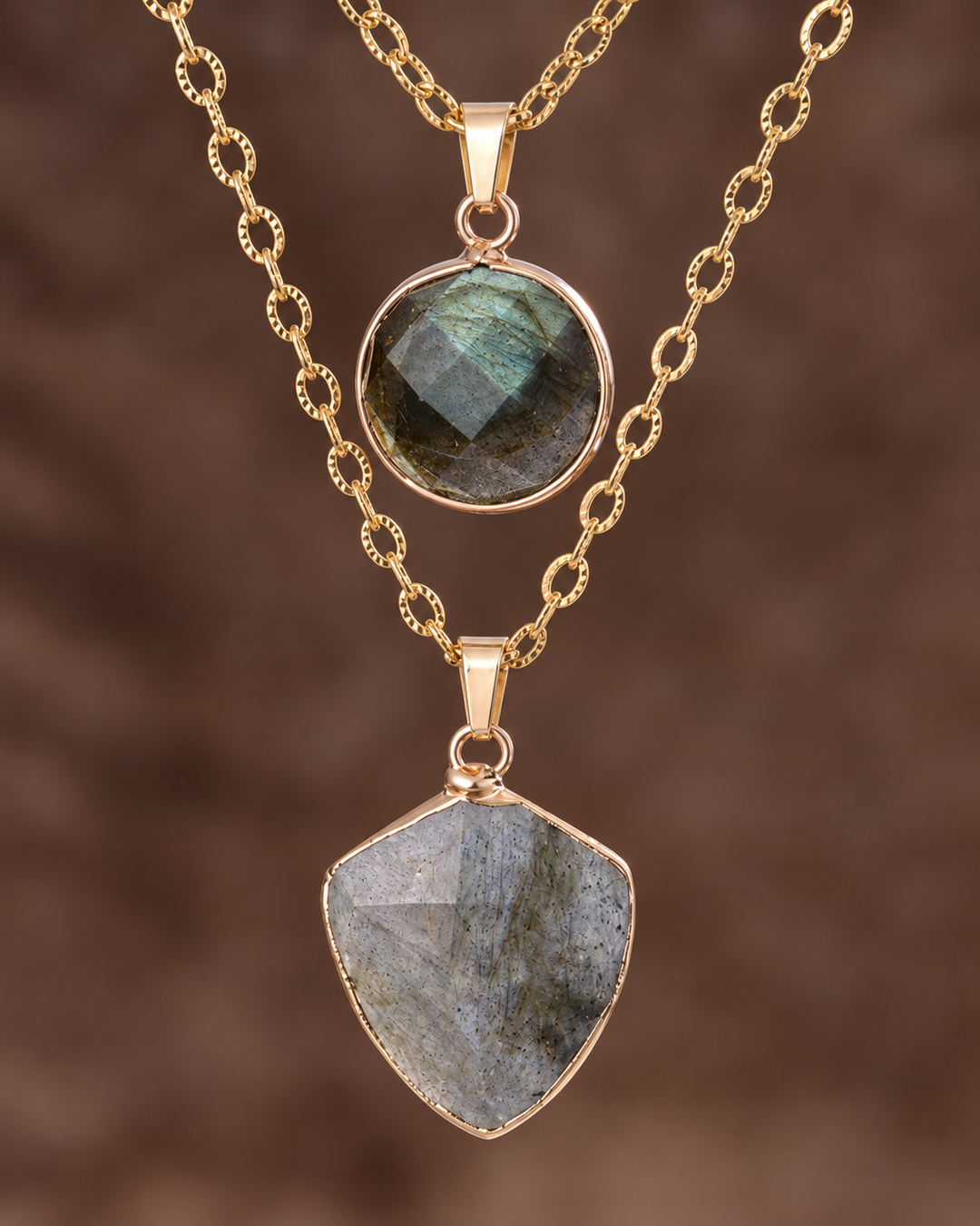 Close-up detail of the layered stone pendant necklace