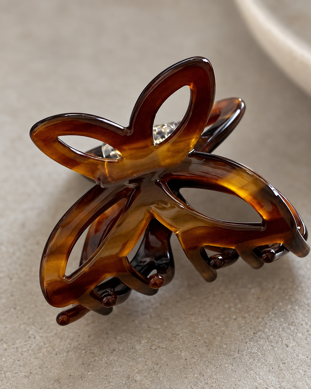 Close-up detail of the tortoiseshell butterfly hair claw