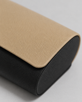 Close-up detail of the two-tone glasses case