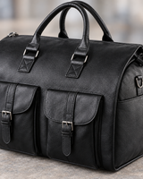 Close-up detail of the black folding weekender bag