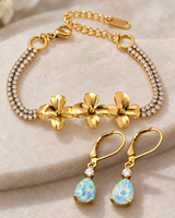 Close-up of the gold-tone flowers and opal-look stones