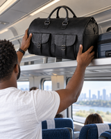 Black folding weekender bag lifted onto a train luggage rack